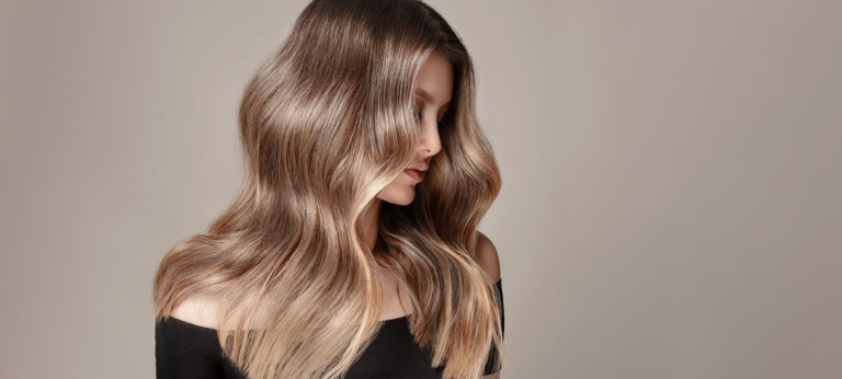 Glossy dimensional brunette hair from a hairdresser Dandenong clients visit in Endeavour Hills